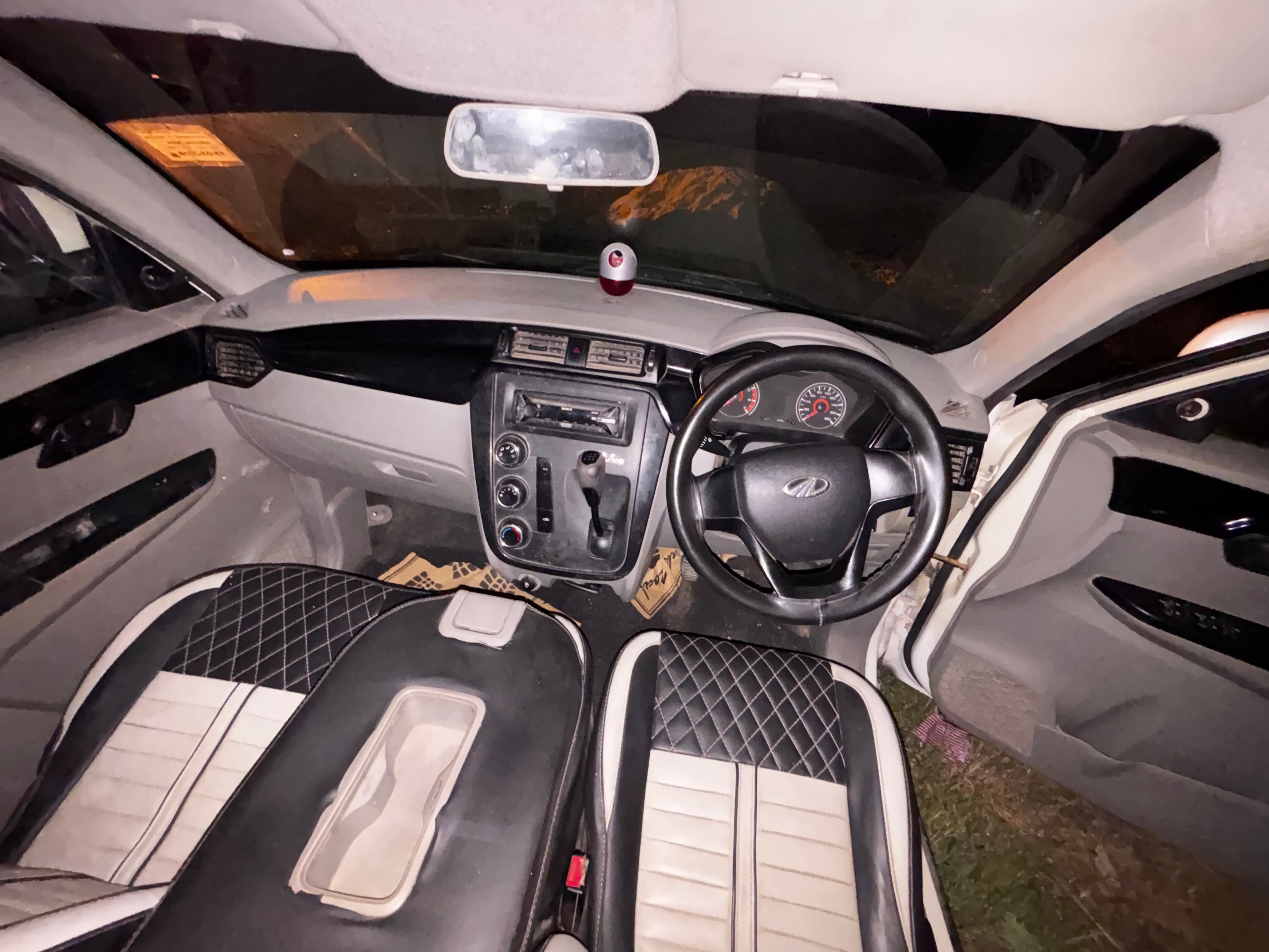 interior dashboard of a Mahindra KUV 100 NXT