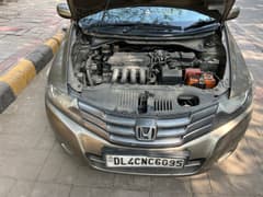 Engine bay view of a Honda City