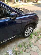 Front side view of a Nexa Blue Maruti Suzuki Grand Vitara