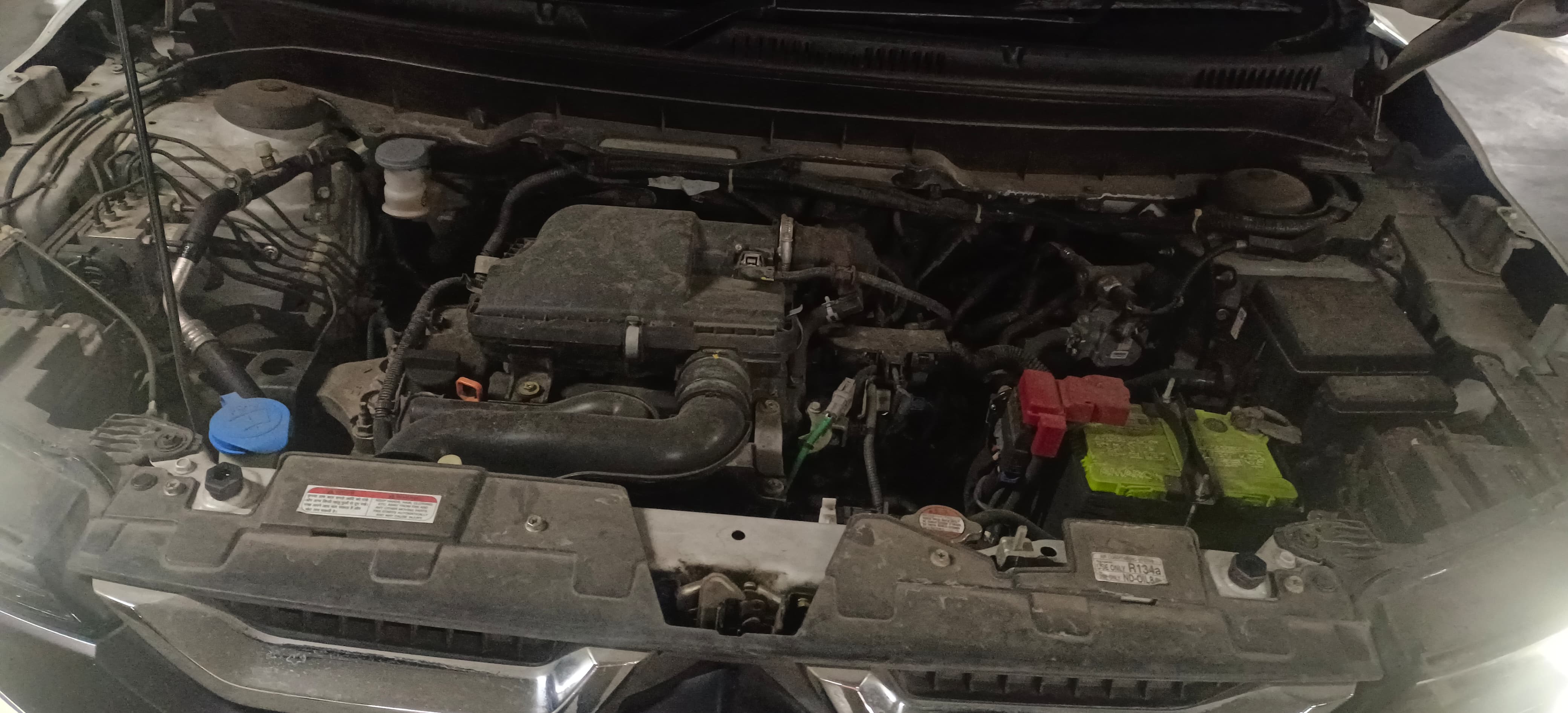 Engine bay view of a Maruti Suzuki Brezza