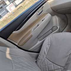 Front passenger door interior of a Maruti Suzuki Ciaz