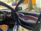 Driver side interior view of a Maruti Suzuki Grand Vitara