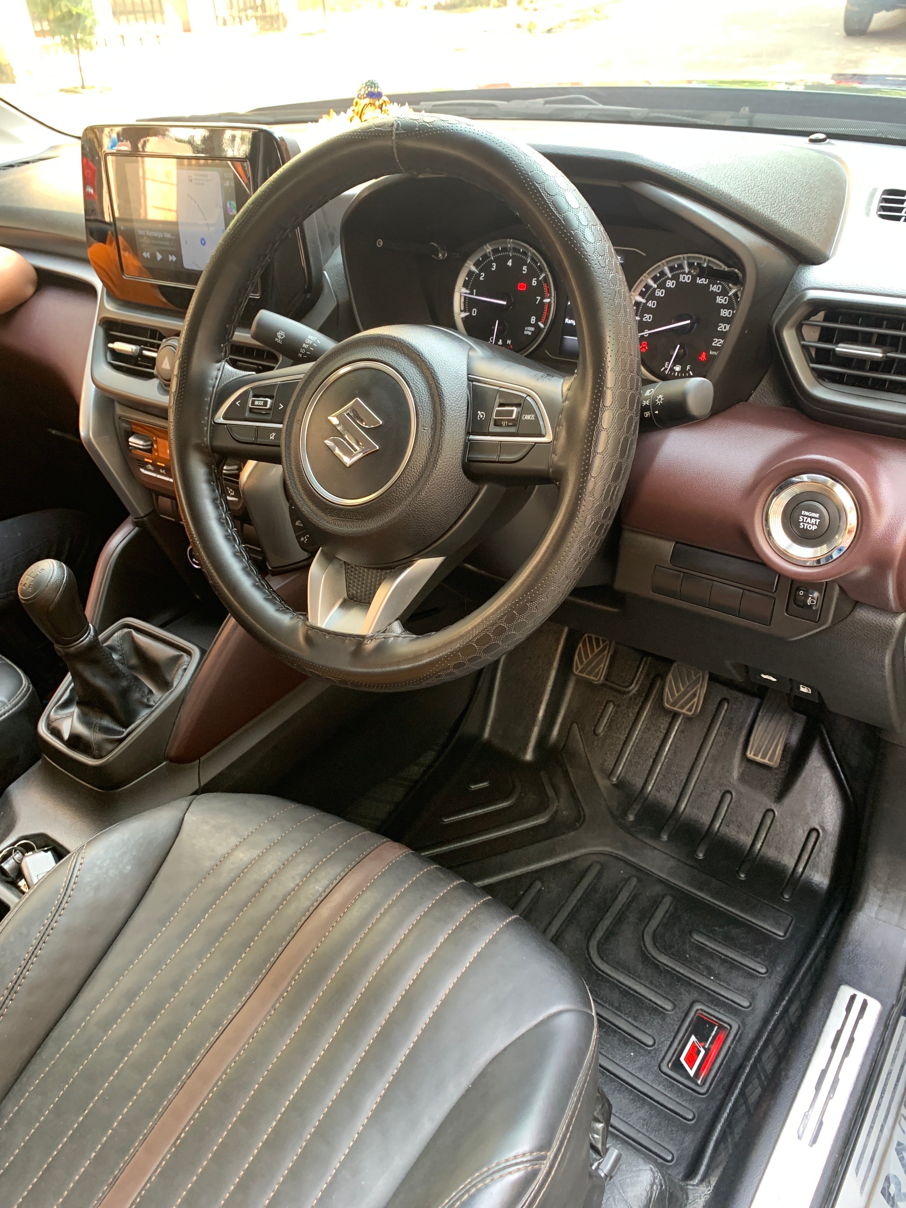 Dashboard and steering wheel of a Maruti Suzuki Grand Vitara