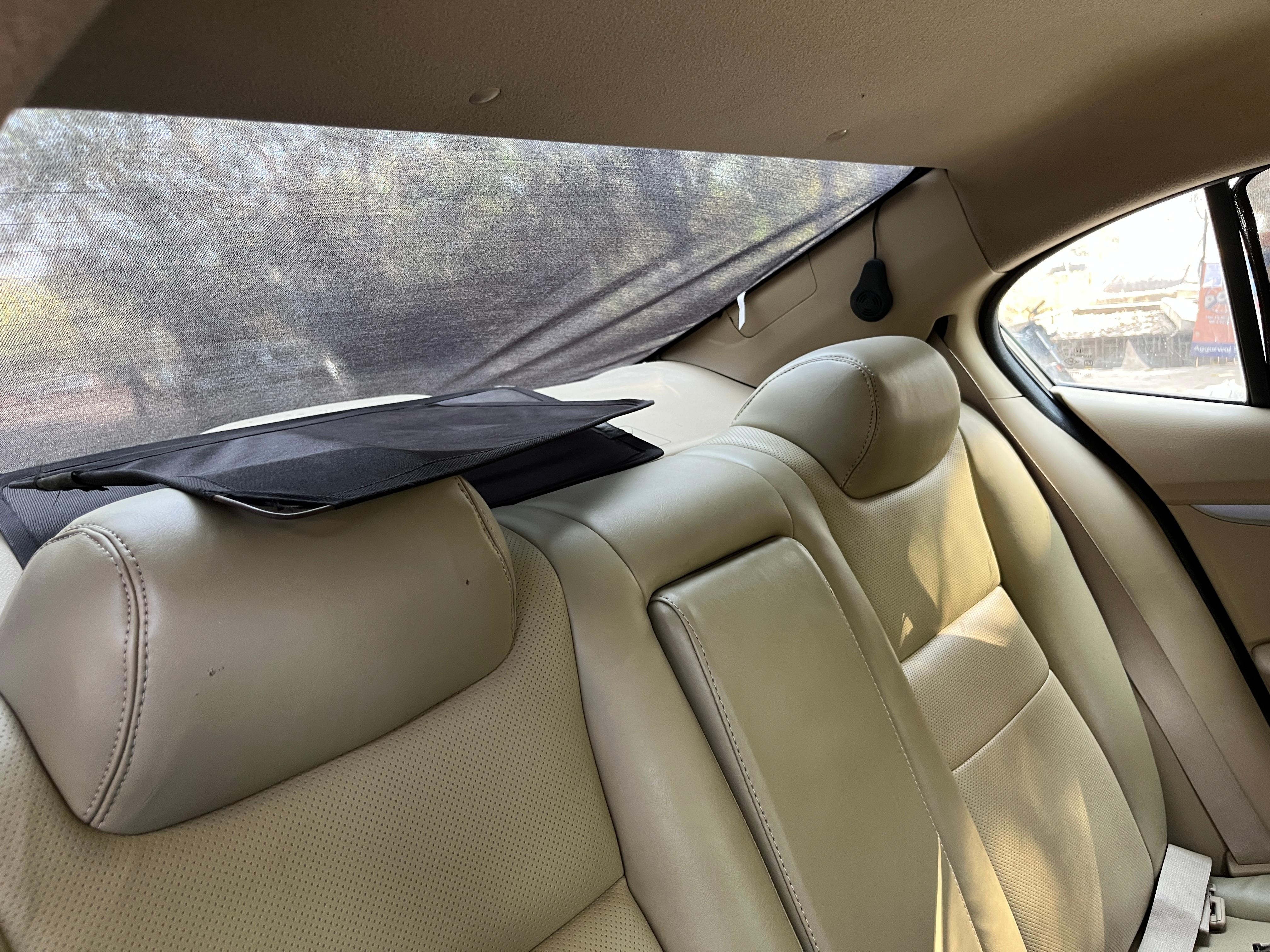Rear seat and sunshade view of a Honda City