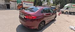 Rear three-quarter of a Honda City VX