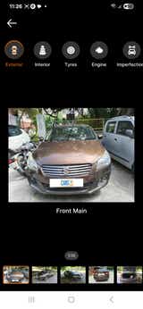 Front main view of a Pearl Metallic Dignity Brown Maruti Suzuki Ciaz
