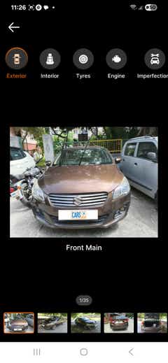 Front main view of a Pearl Metallic Dignity Brown Maruti Suzuki Ciaz