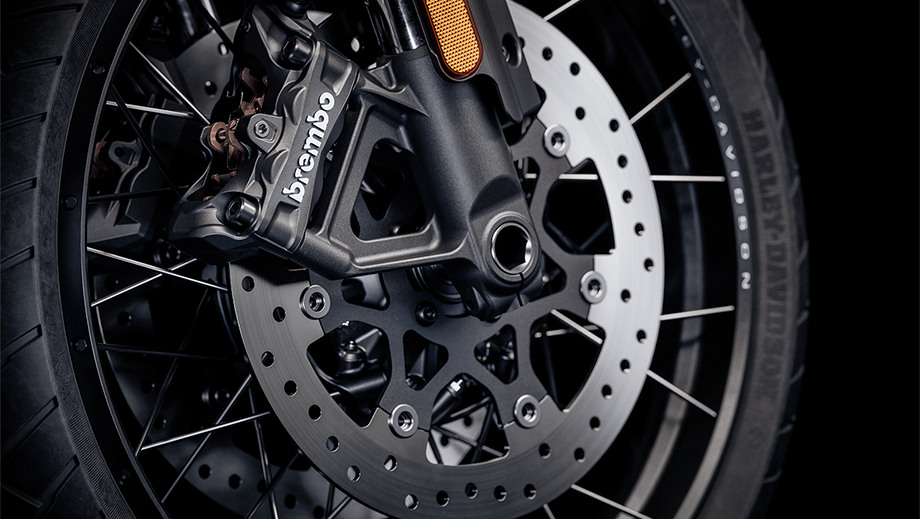 Close-up of the front wheel and brake disc of a Harley-Davidson Pan America 1250 Special