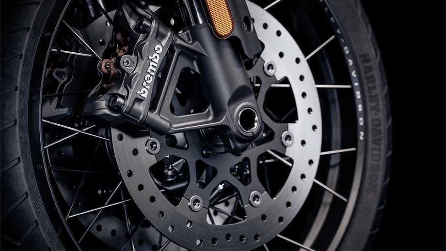 Close-up of the front wheel and brake disc of a Harley-Davidson Pan America 1250 Special