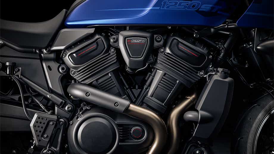 Engine close-up of a aurora blue denim Harley-Davidson Pan America 1250 ST