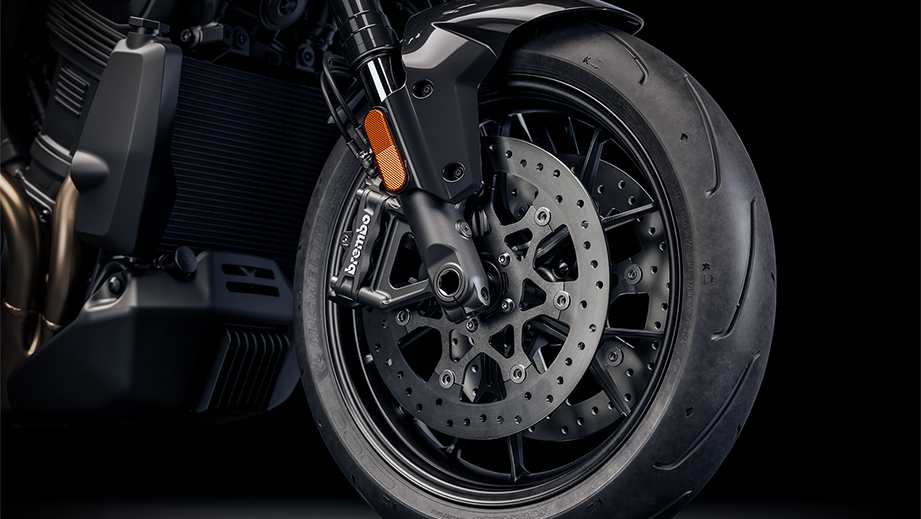 Front wheel and brake close-up of a Vivid Black Harley-Davidson Pan America 1250 ST