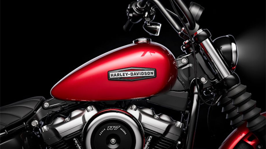 Side view of a brilliant red Harley-Davidson Street Bob motorcycle