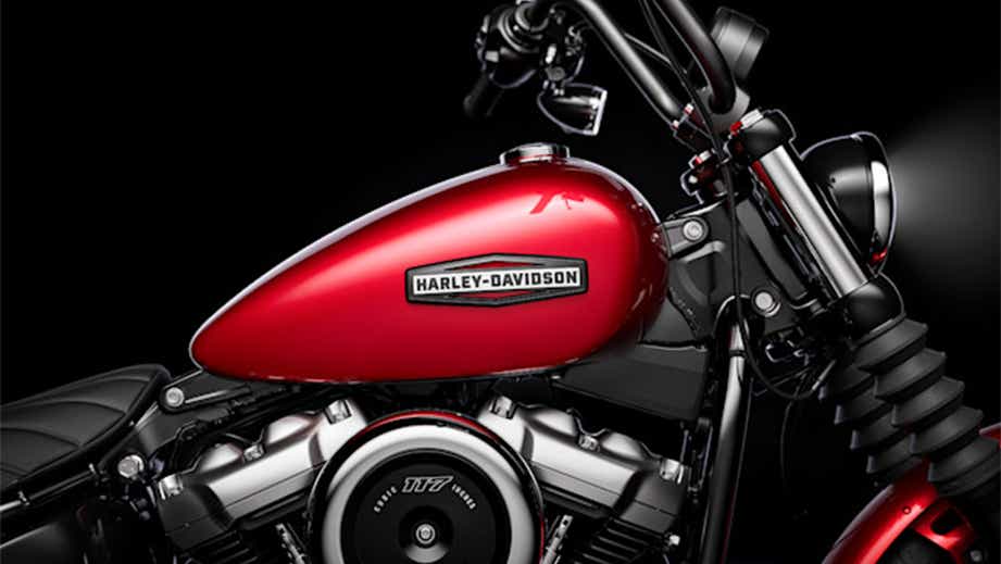 Side view of a brilliant red Harley-Davidson Street Bob motorcycle
