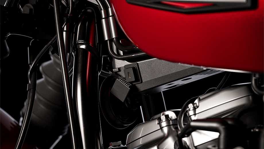 Engine and tank detail view of a brilliant red Harley-Davidson Street Bob
