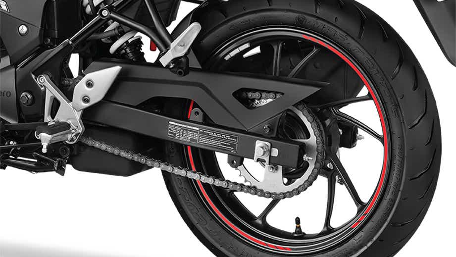 Rear wheel and chain view of a Stealth Black Hero Xtreme 160R