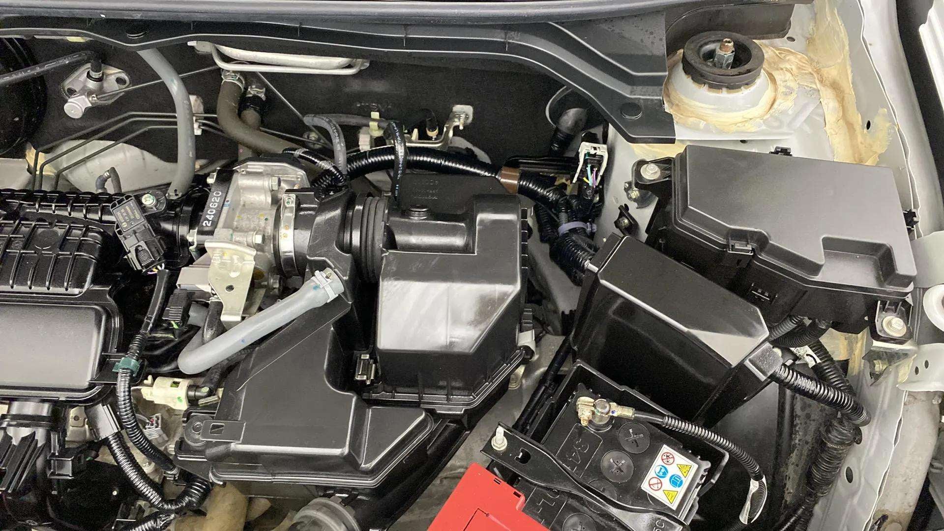 Engine bay view of a Honda Amaze
