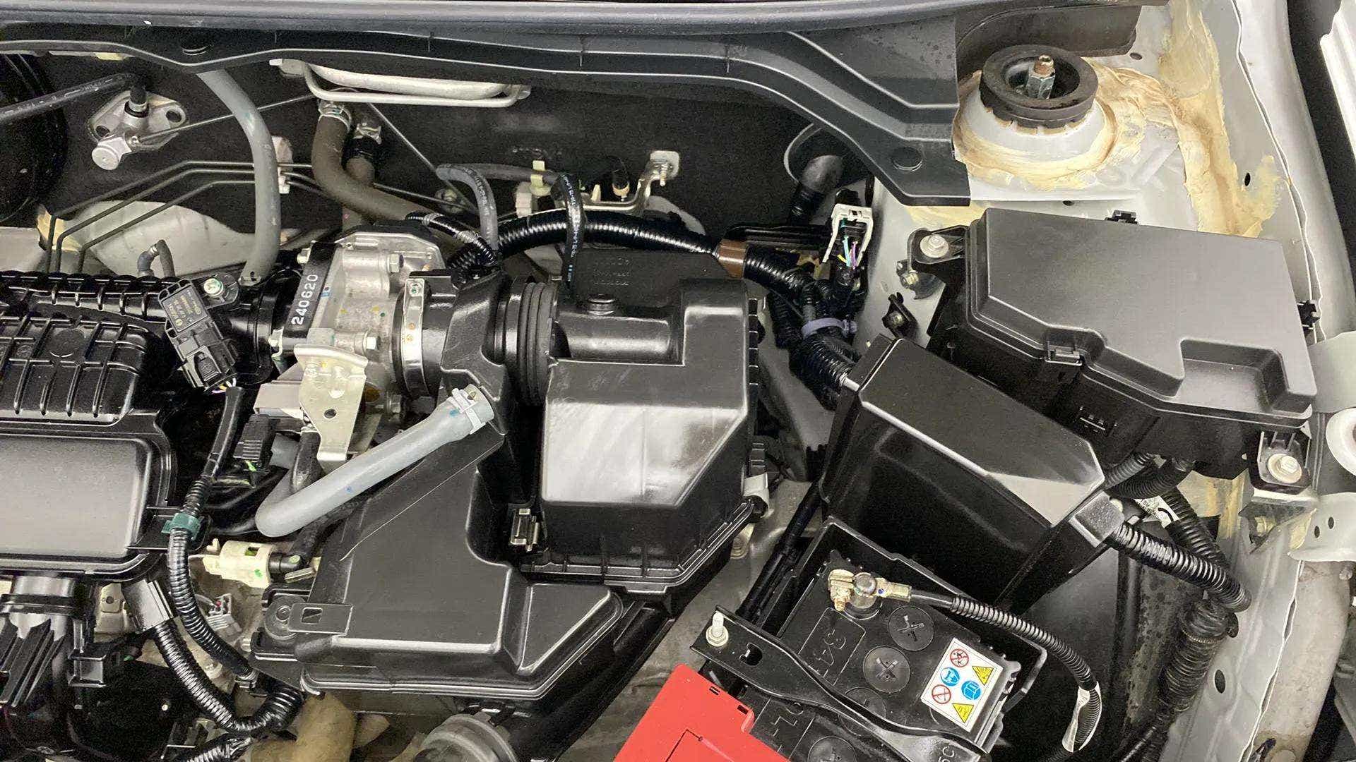Engine bay view of a Honda Amaze