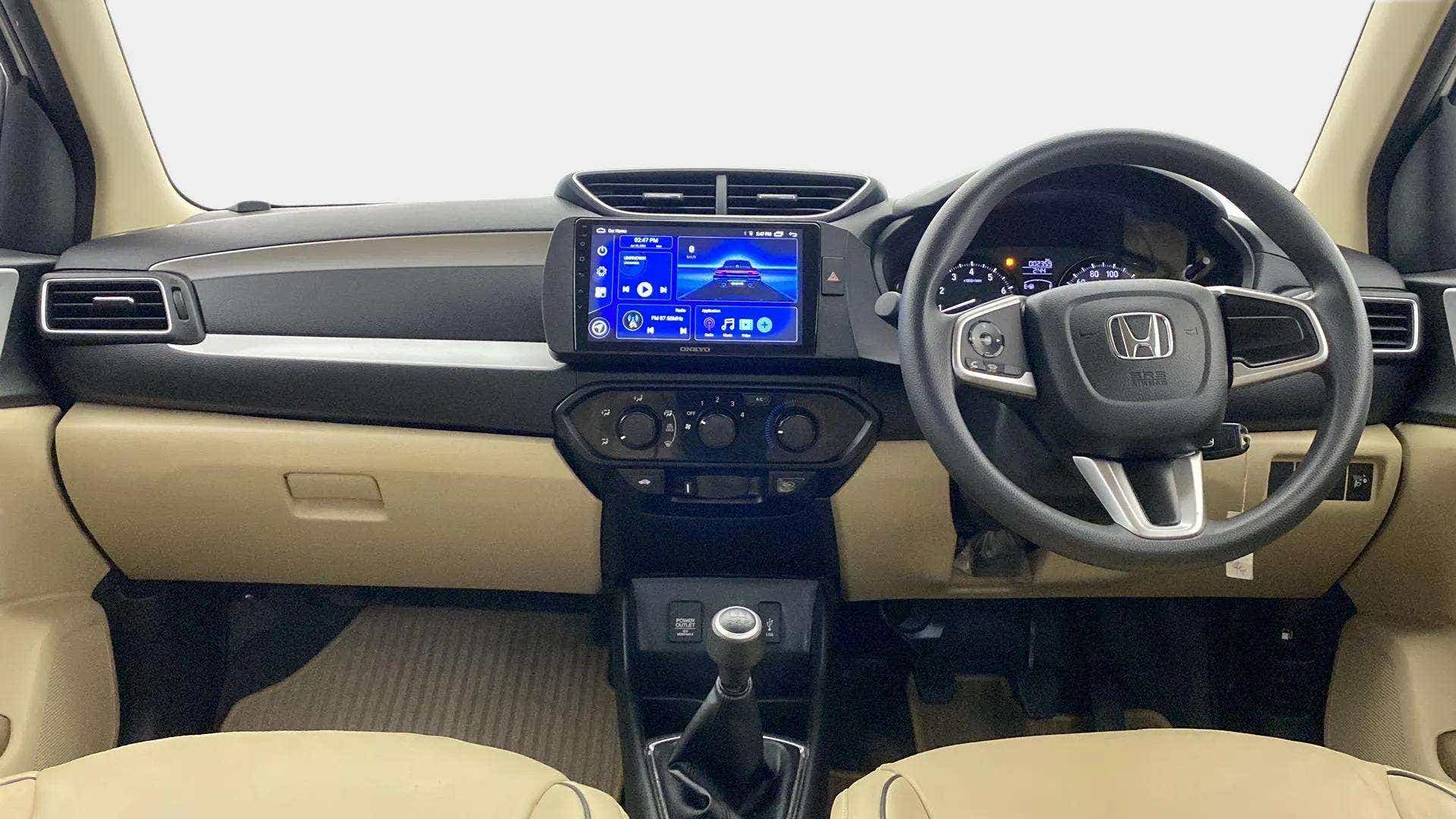 Interior dashboard view of a Honda Amaze