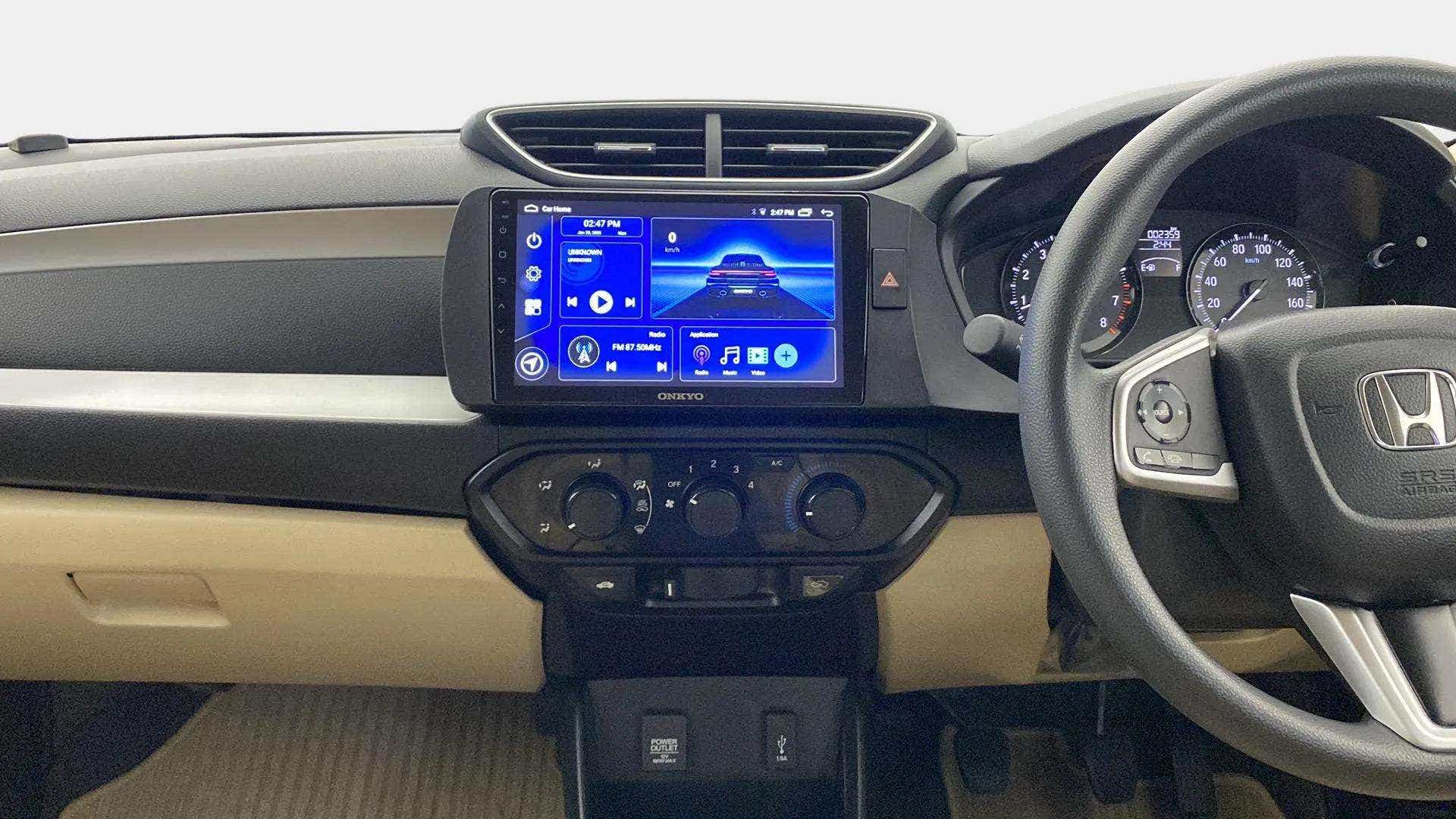 Dashboard and steering wheel of a Honda Amaze interior