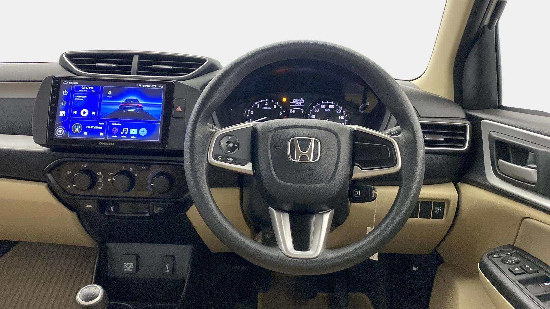 Interior dashboard view of a Honda Amaze