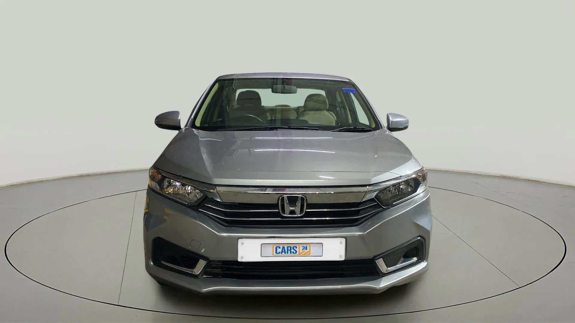 Front view of a Meteoroid Grey Metallic Honda Amaze