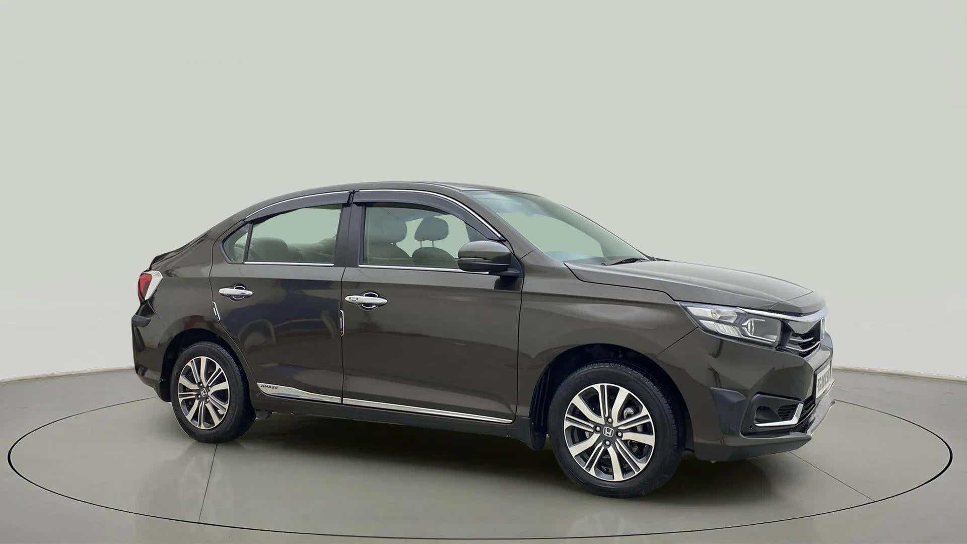 Side view of a meteoroid grey metallic Honda Amaze