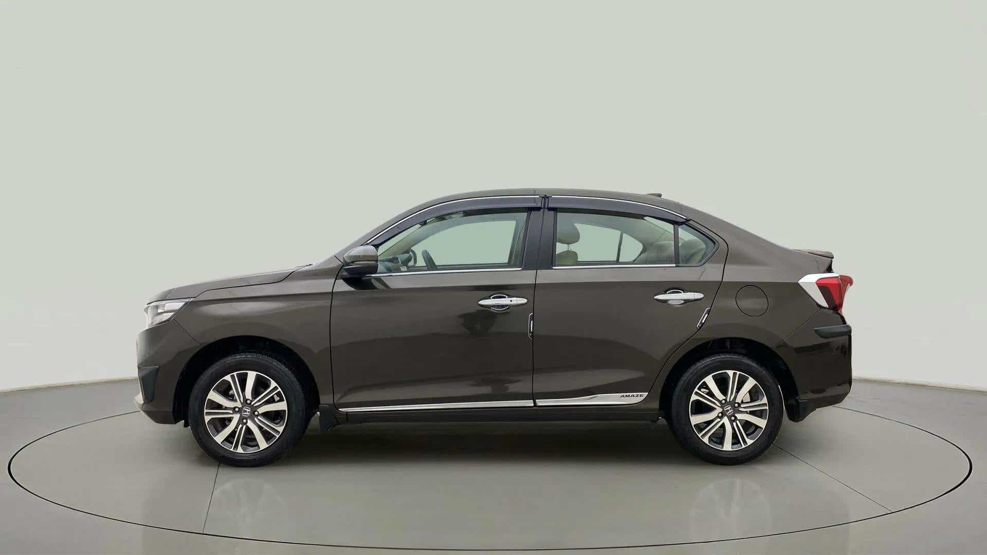 Side profile of a Meteoroid Grey Metallic Honda Amaze