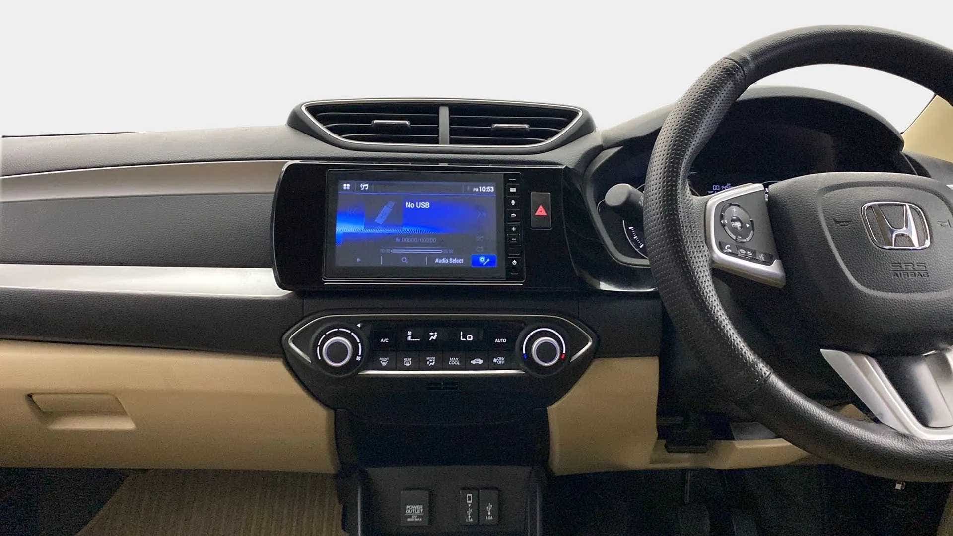 Dashboard and steering wheel of a Honda Amaze