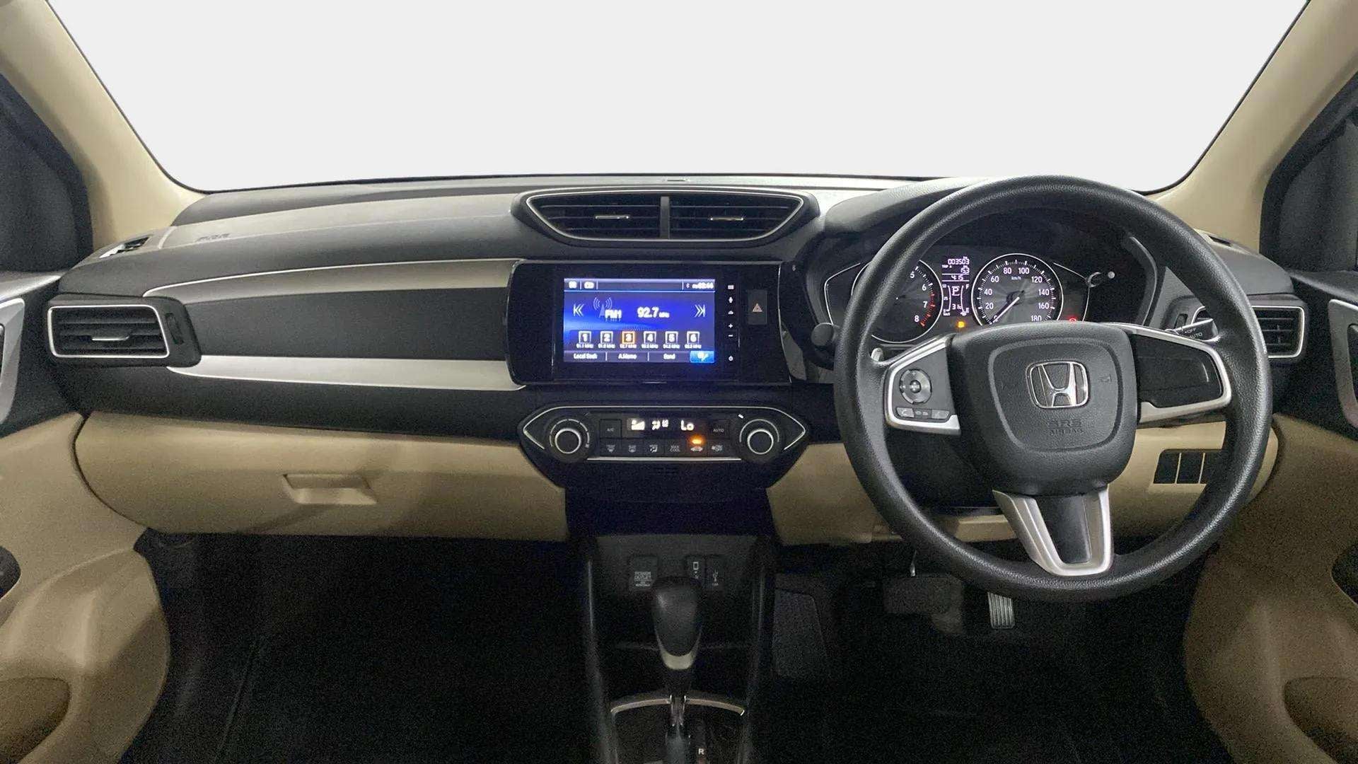Dashboard and steering wheel of a Honda Amaze