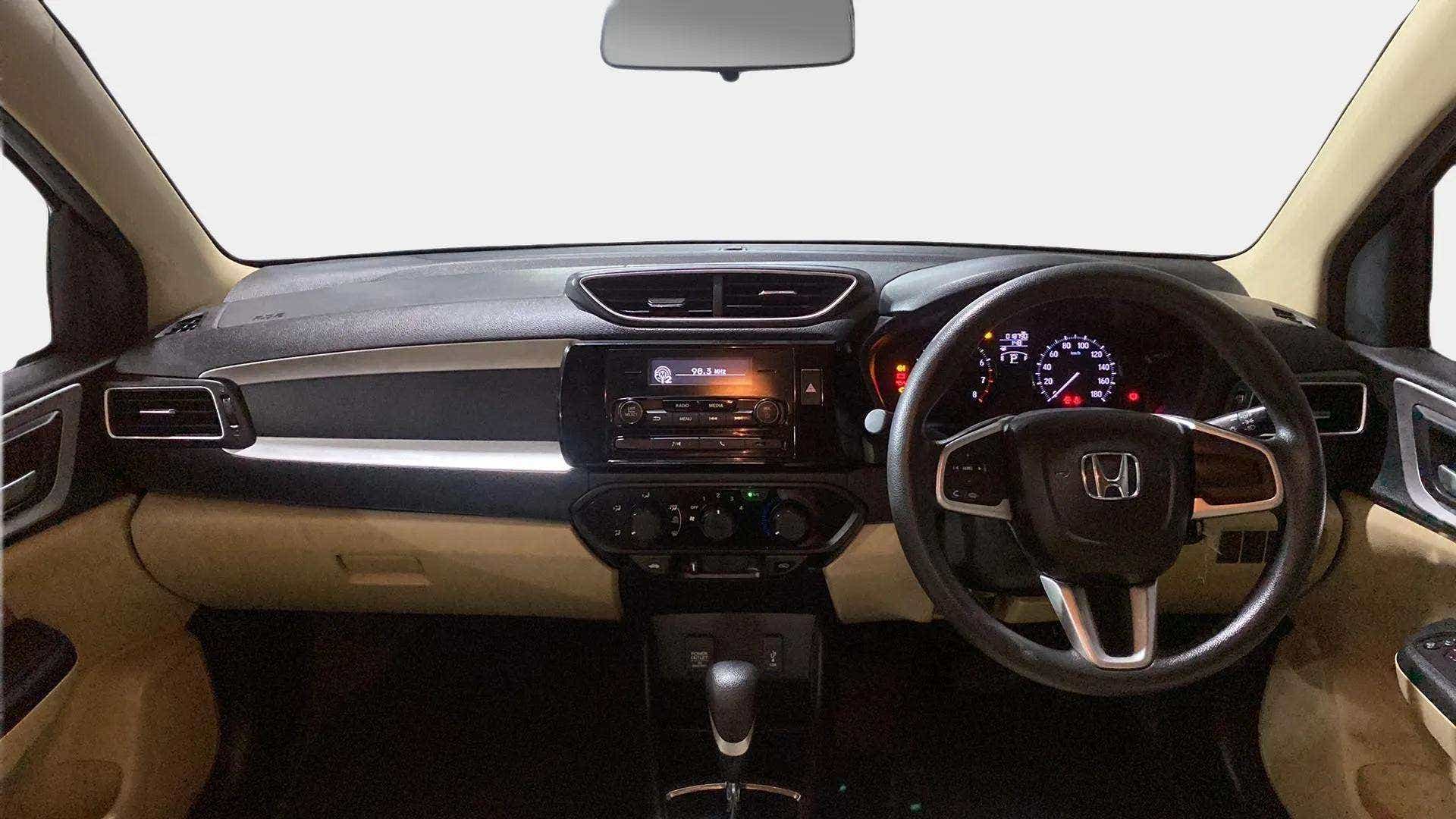 Interior dashboard view of a Honda Amaze