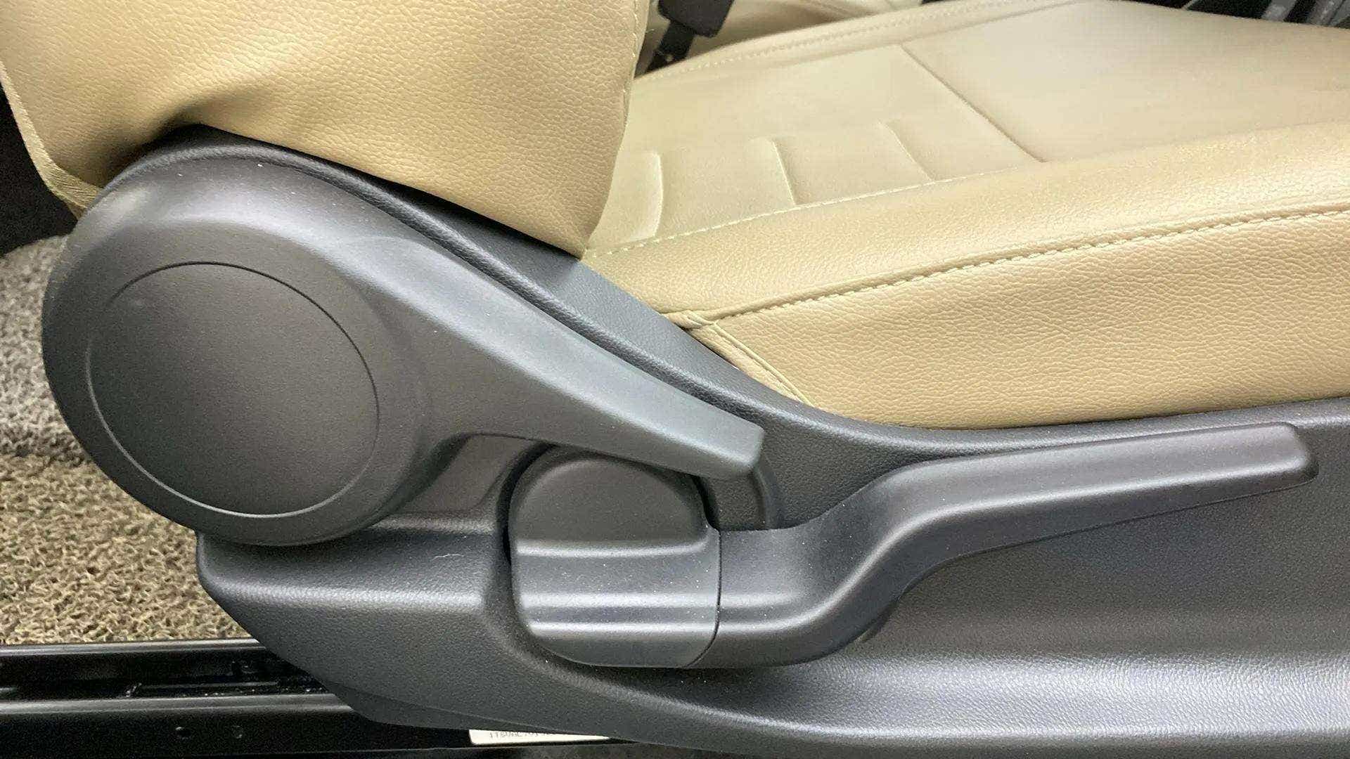 Side view of a honda amaze front seat adjustment lever