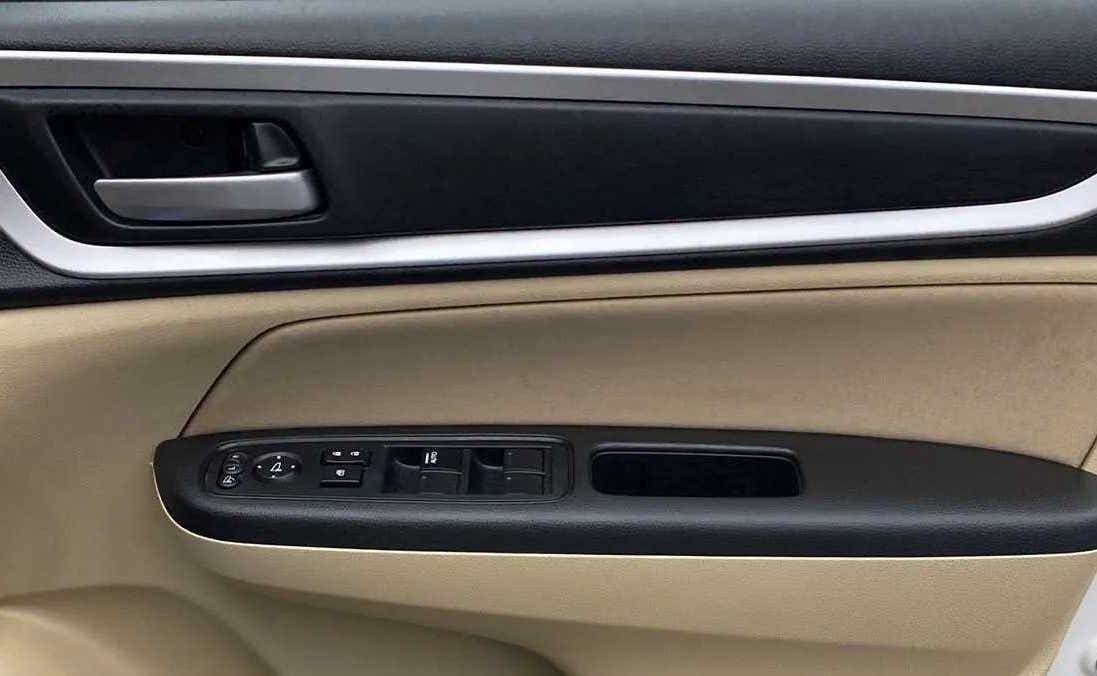 Driver side door controls of a Honda Amaze