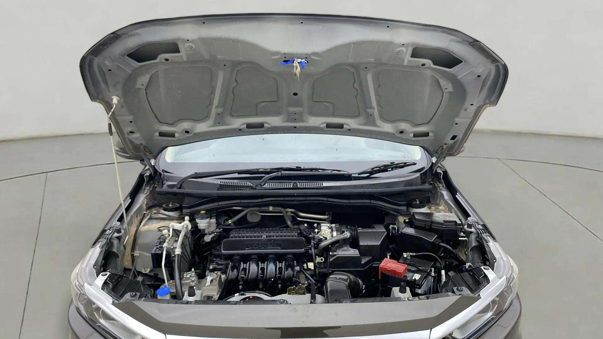 Engine bay view of a Honda Amaze