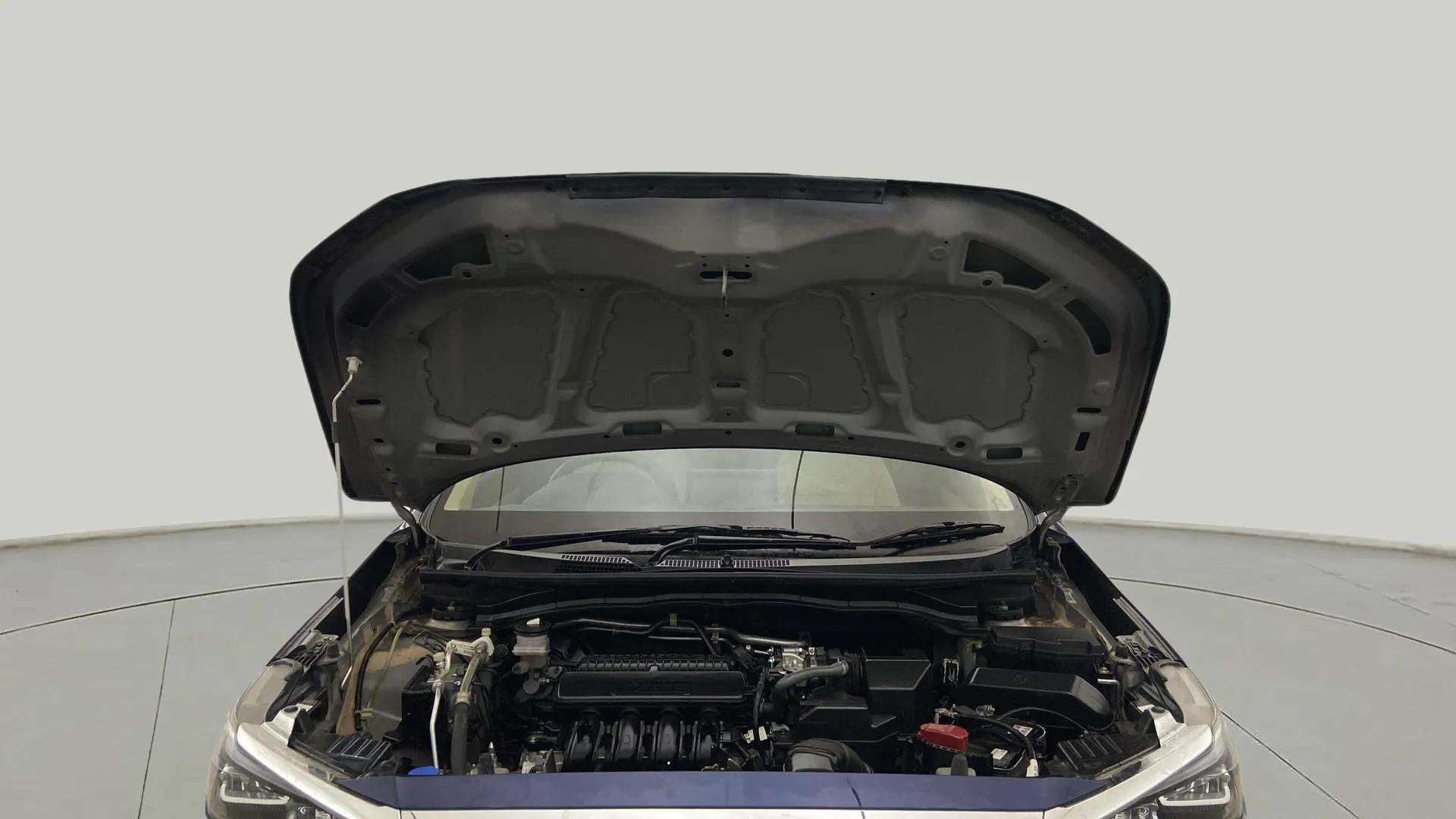 Engine bay view of a Honda Amaze