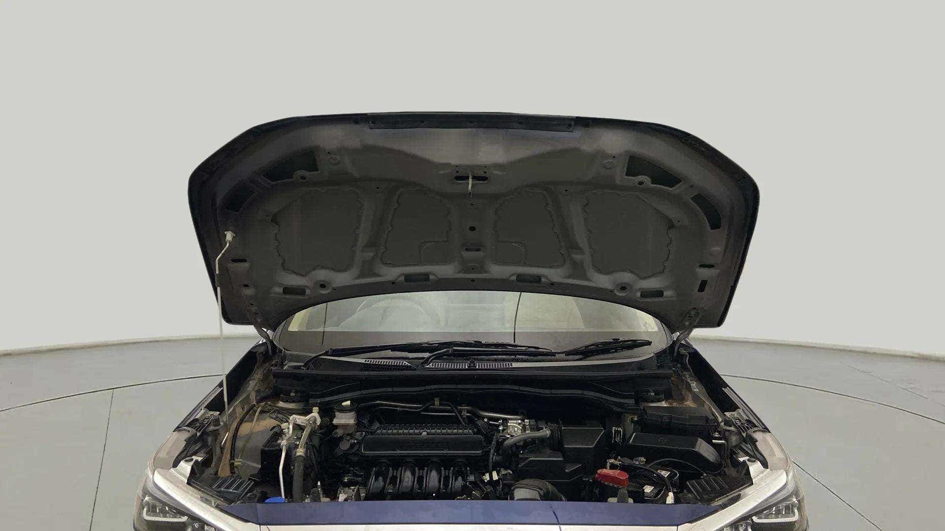 Engine bay view of a Honda Amaze
