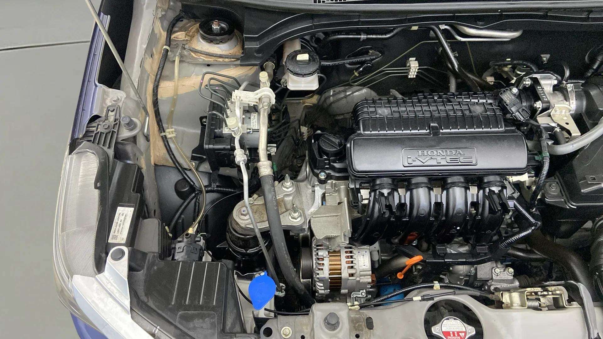 Engine bay view of a Honda Amaze