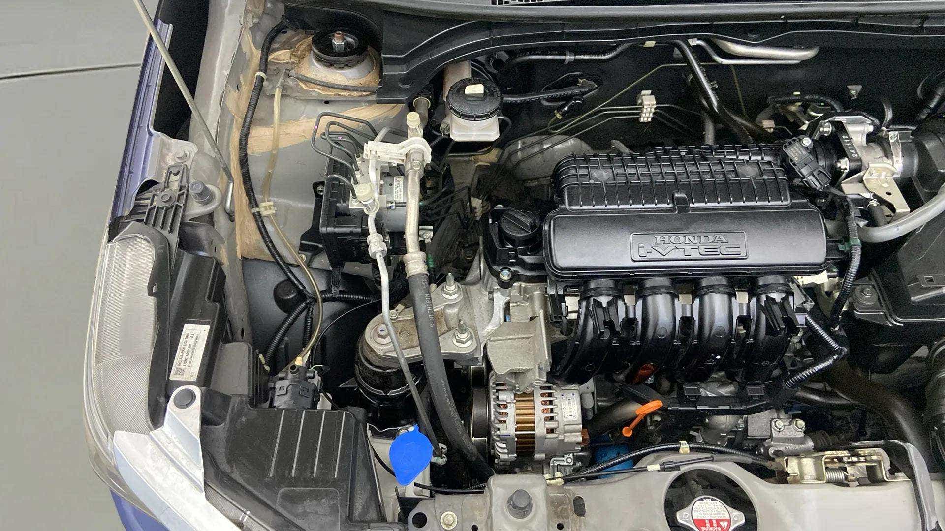 Engine bay view of a Honda Amaze