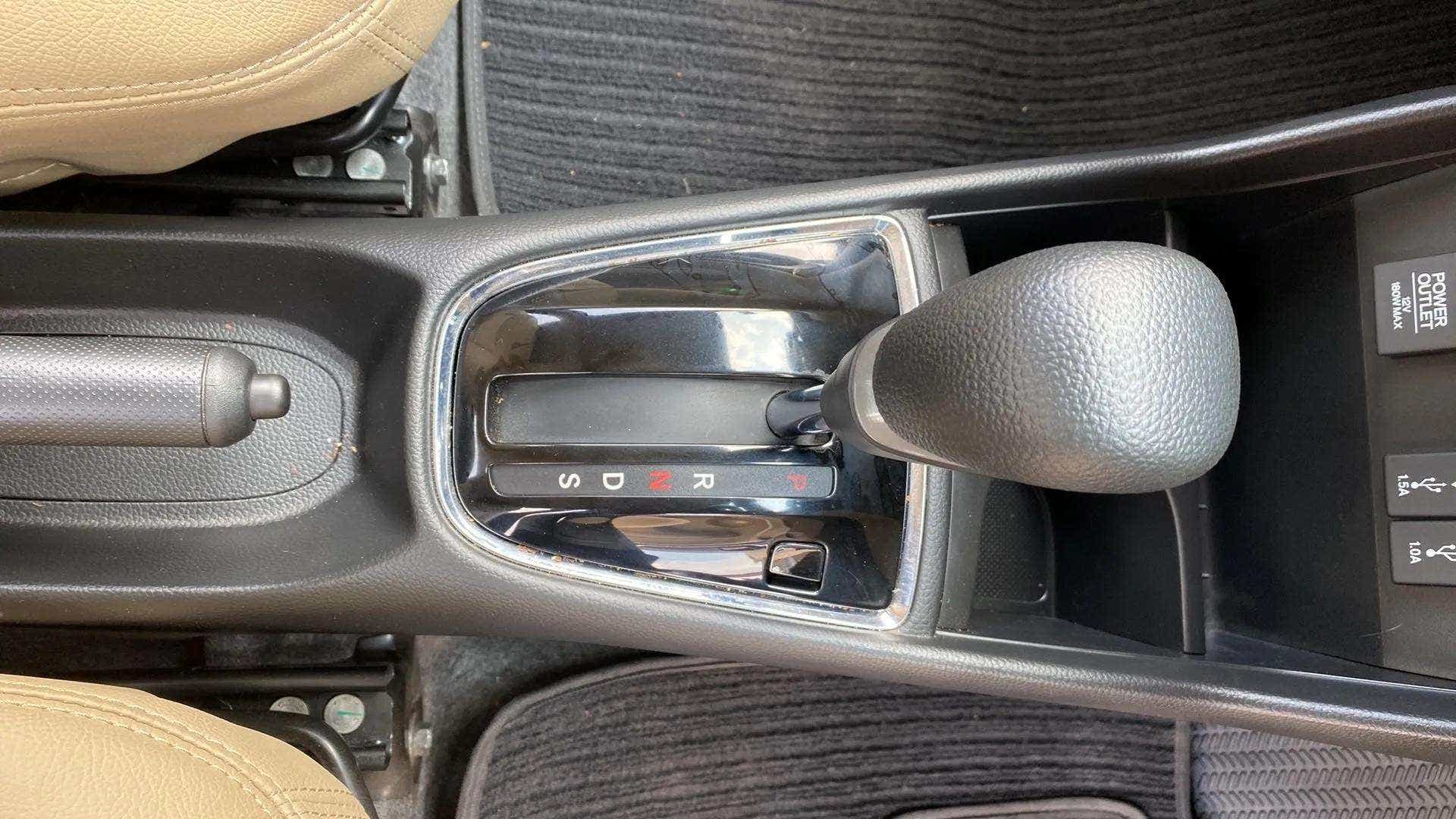 Center console gear shifter of a Honda Amaze