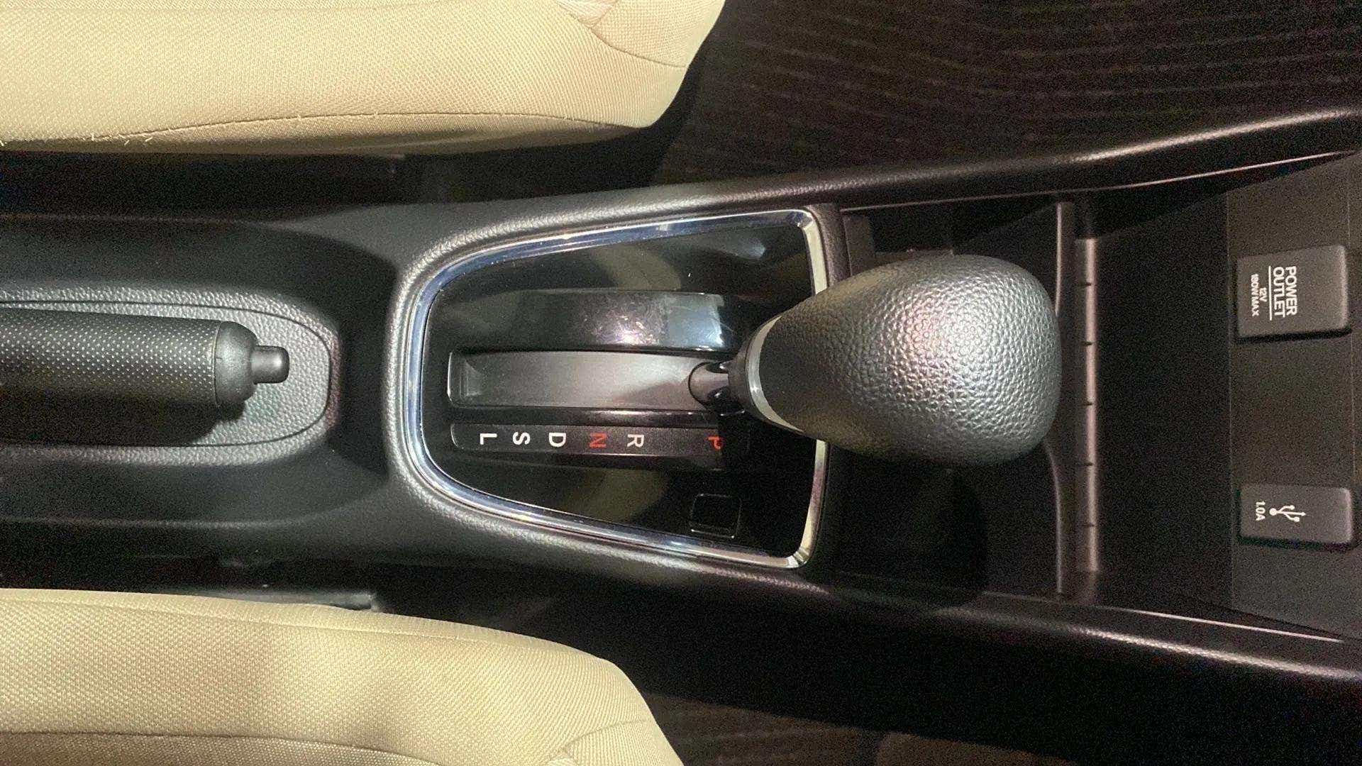 Gear lever and center console of a Honda Amaze