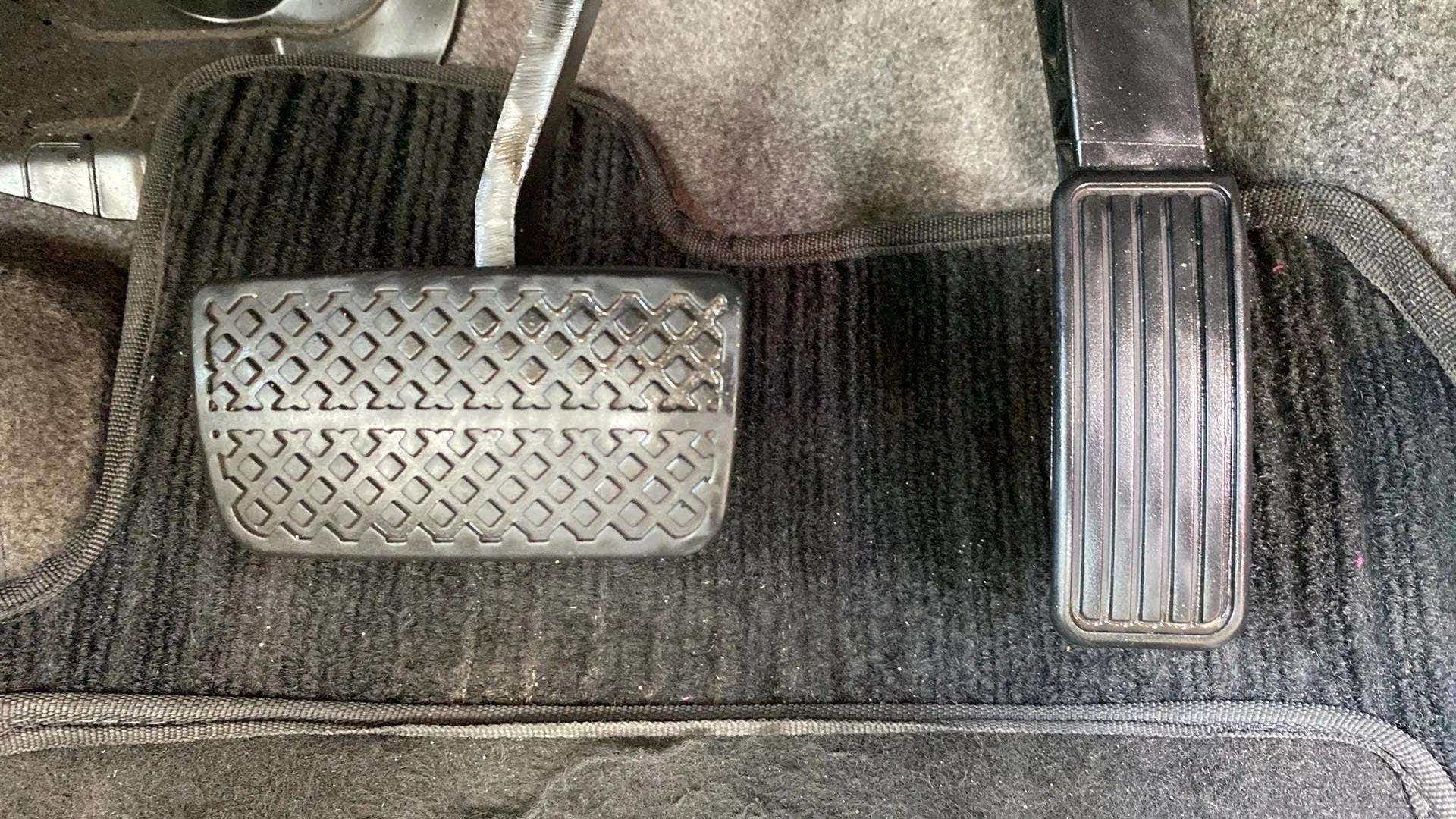Close-up of the foot pedals of a Honda Amaze