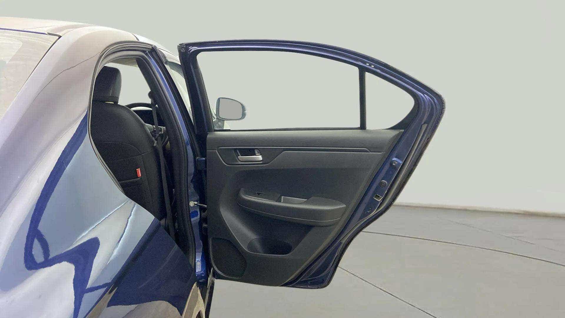 Rear door open view of a Honda Amaze