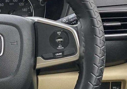 Steering wheel and cruise control of a Honda Amaze