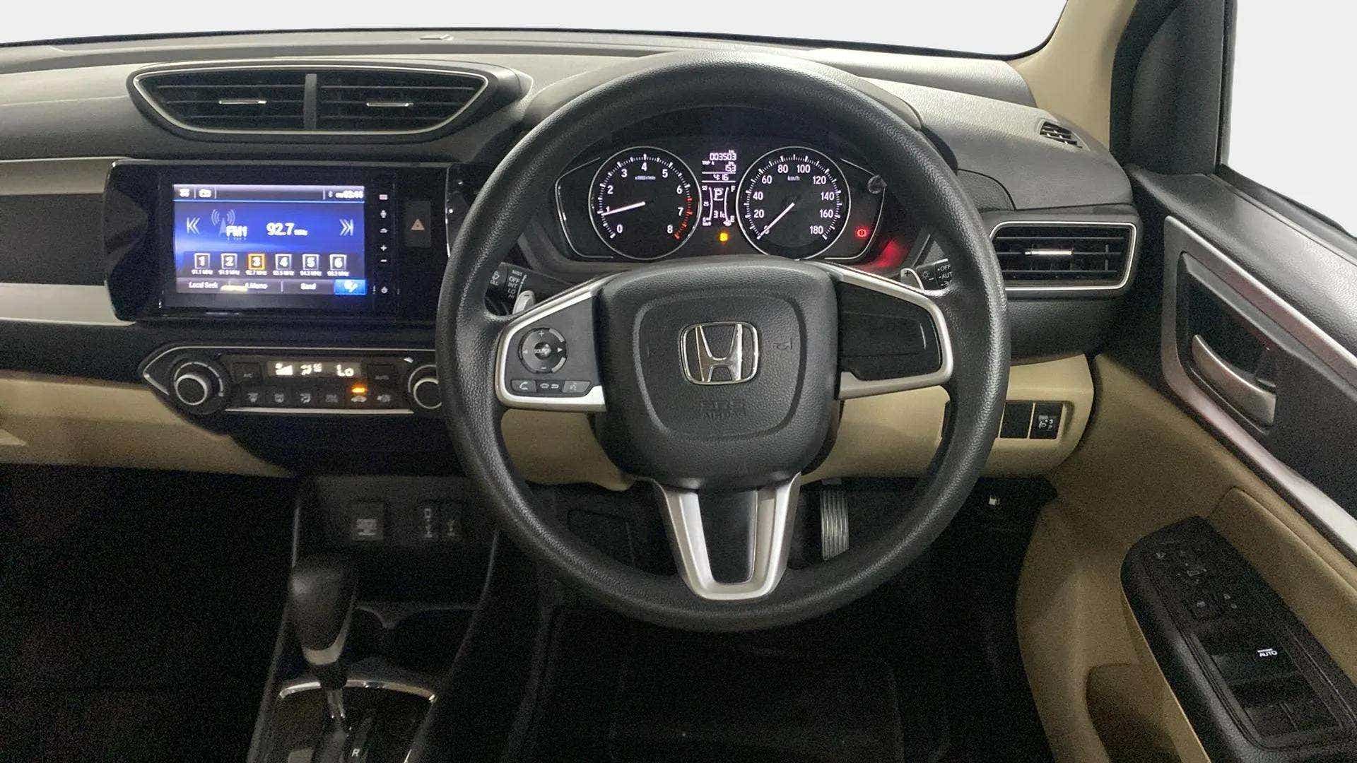 Dashboard and steering wheel of a Honda Amaze
