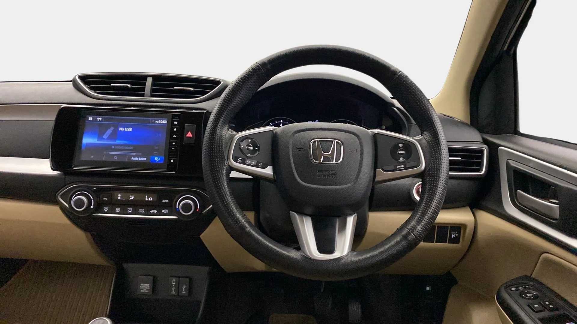 Dashboard and steering wheel view of a Honda Amaze