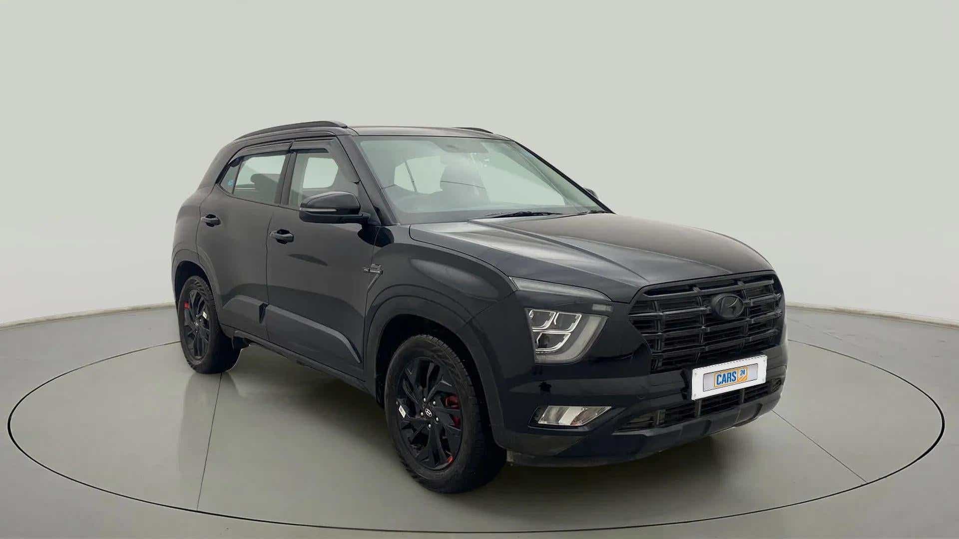 Front three-quarter view of a knight black Hyundai Creta 2018-2023