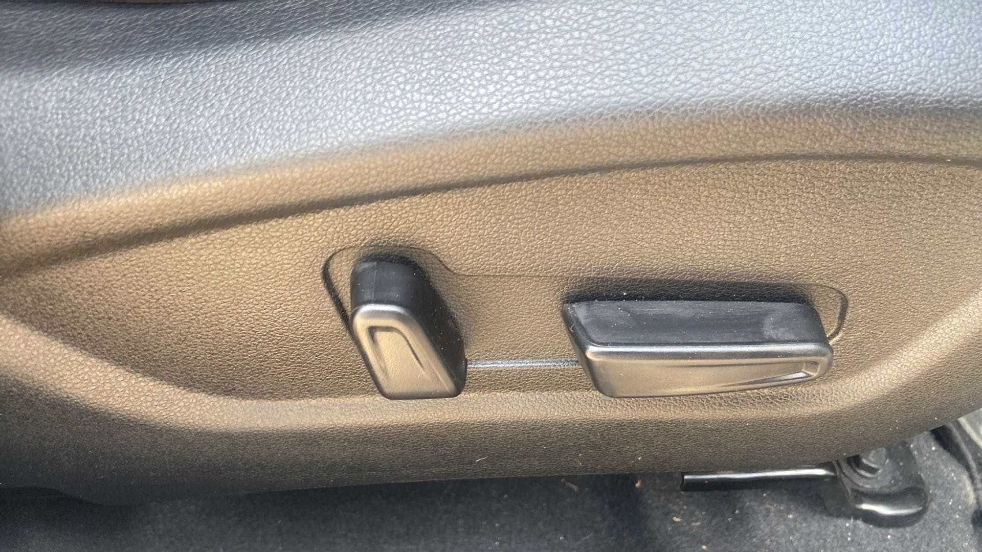 Close-up of seat adjustment controls of a Hyundai Creta 2018-2023
