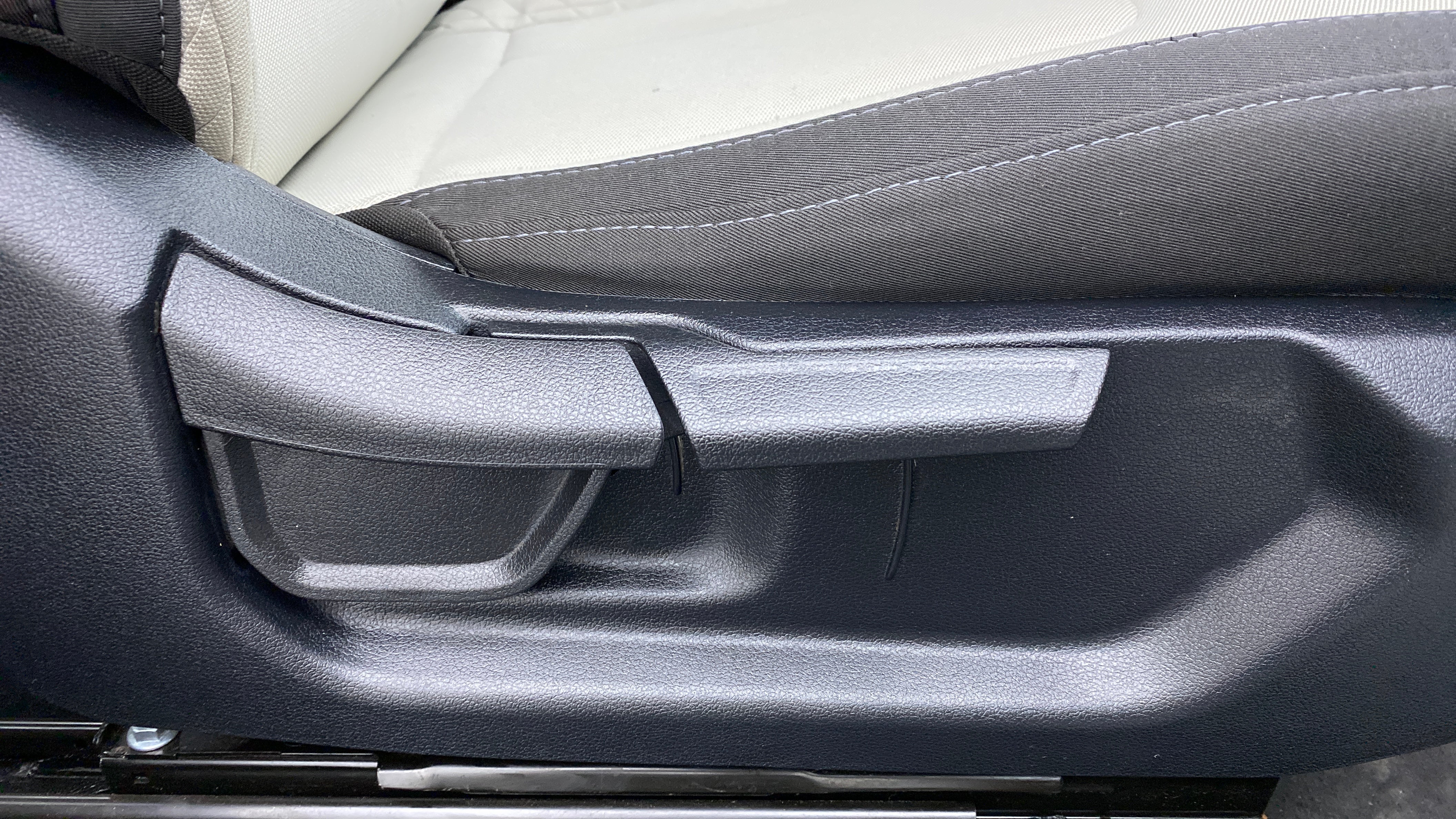 Side view of a seat adjuster lever in a Hyundai Creta 2018-2023