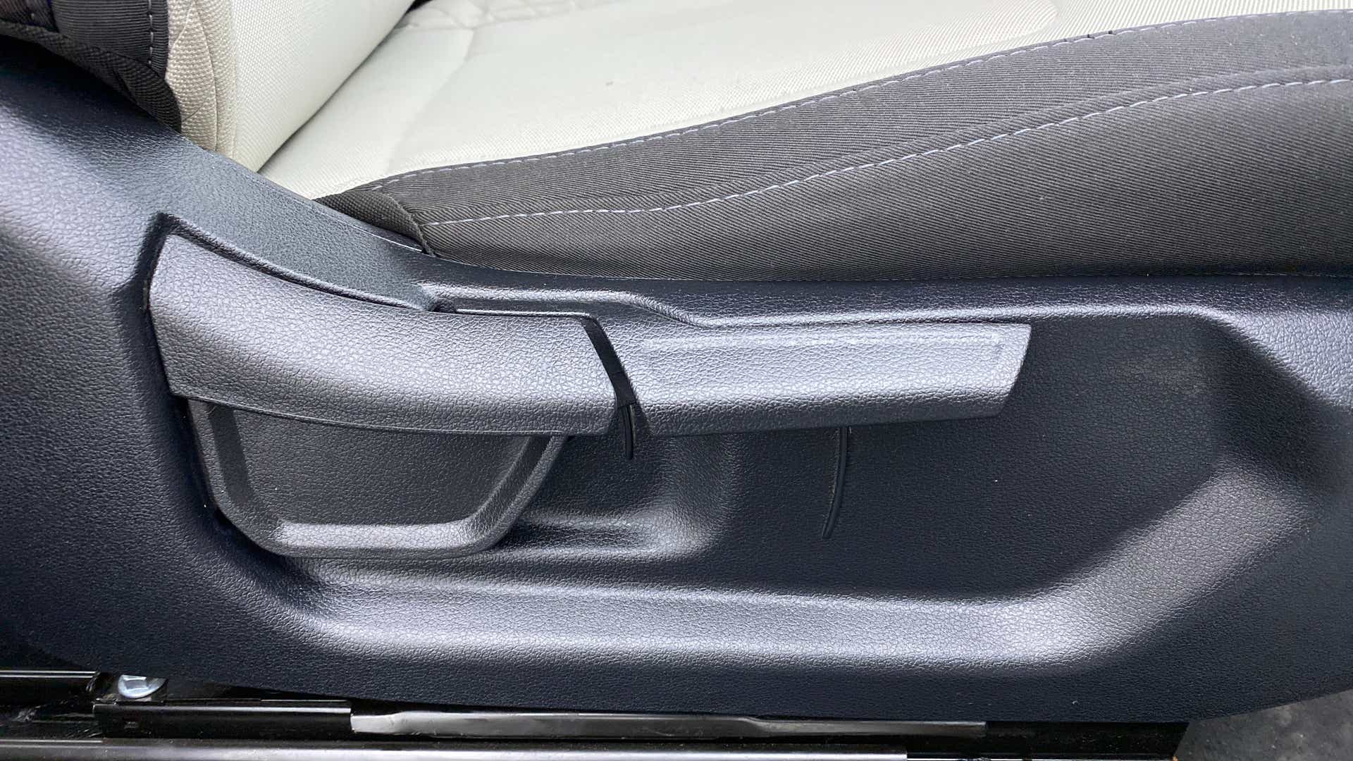 Side view of a seat adjuster lever in a Hyundai Creta 2018-2023