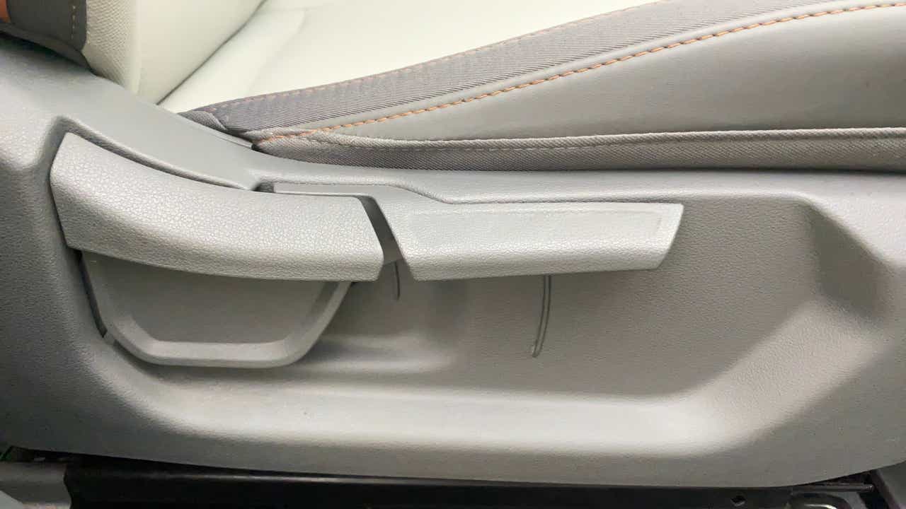 Close-up of driver seat controls in a Hyundai Creta