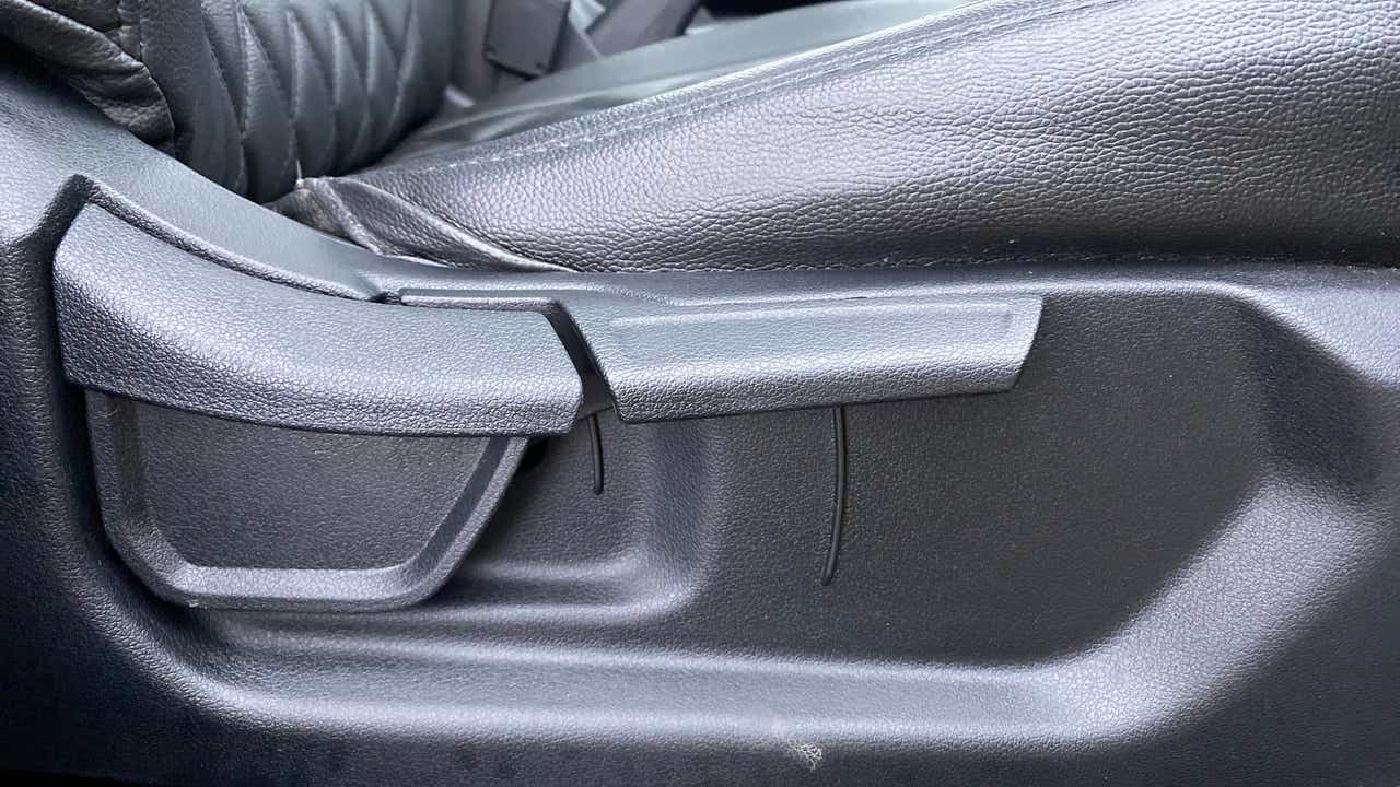 Close-up view of a seat adjustment lever in a Hyundai Creta 2018-2023